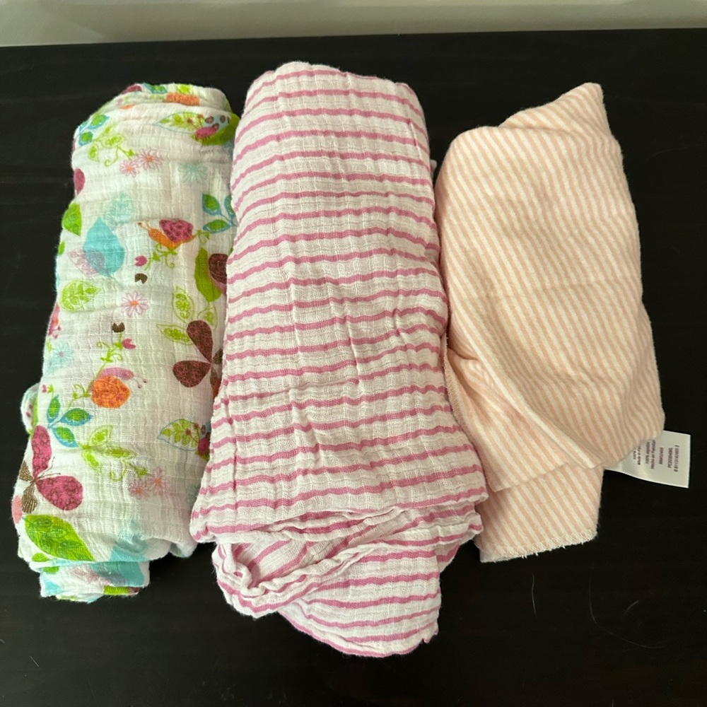 3 girls swaddles